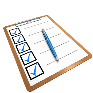 checklist board and pen in white background