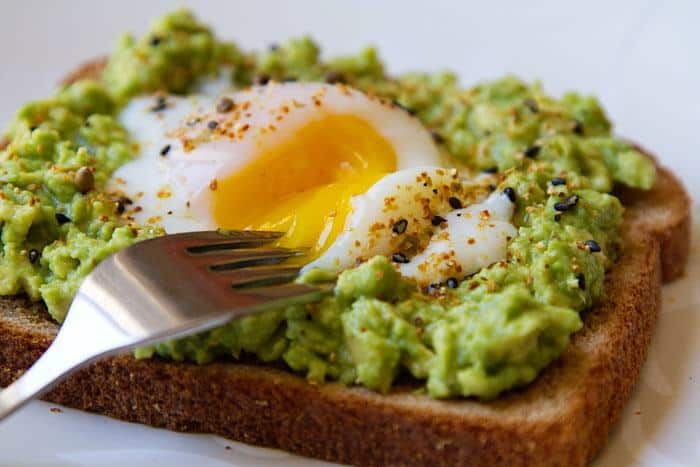 Toast, Egg, and Avocado with fork