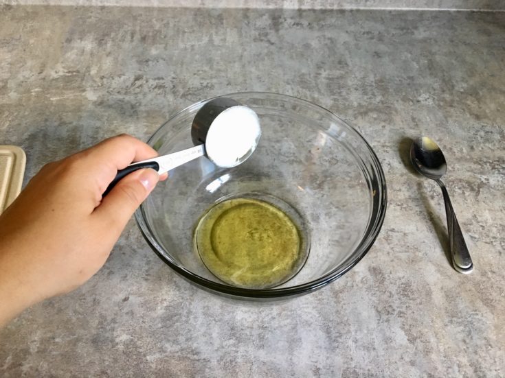 Adding shea butter to the bowl