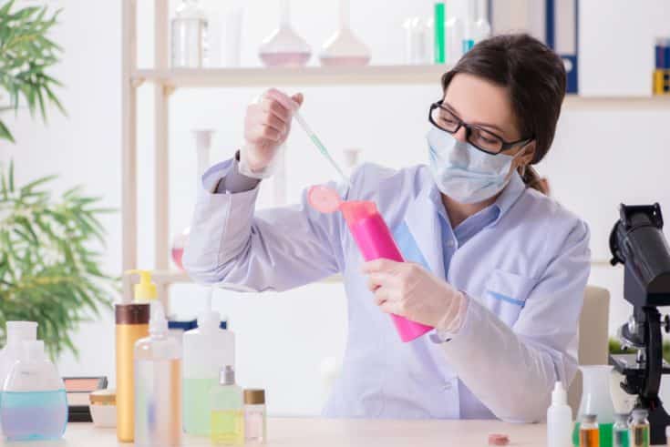 Lab chemist checking beauty and sunscreen products